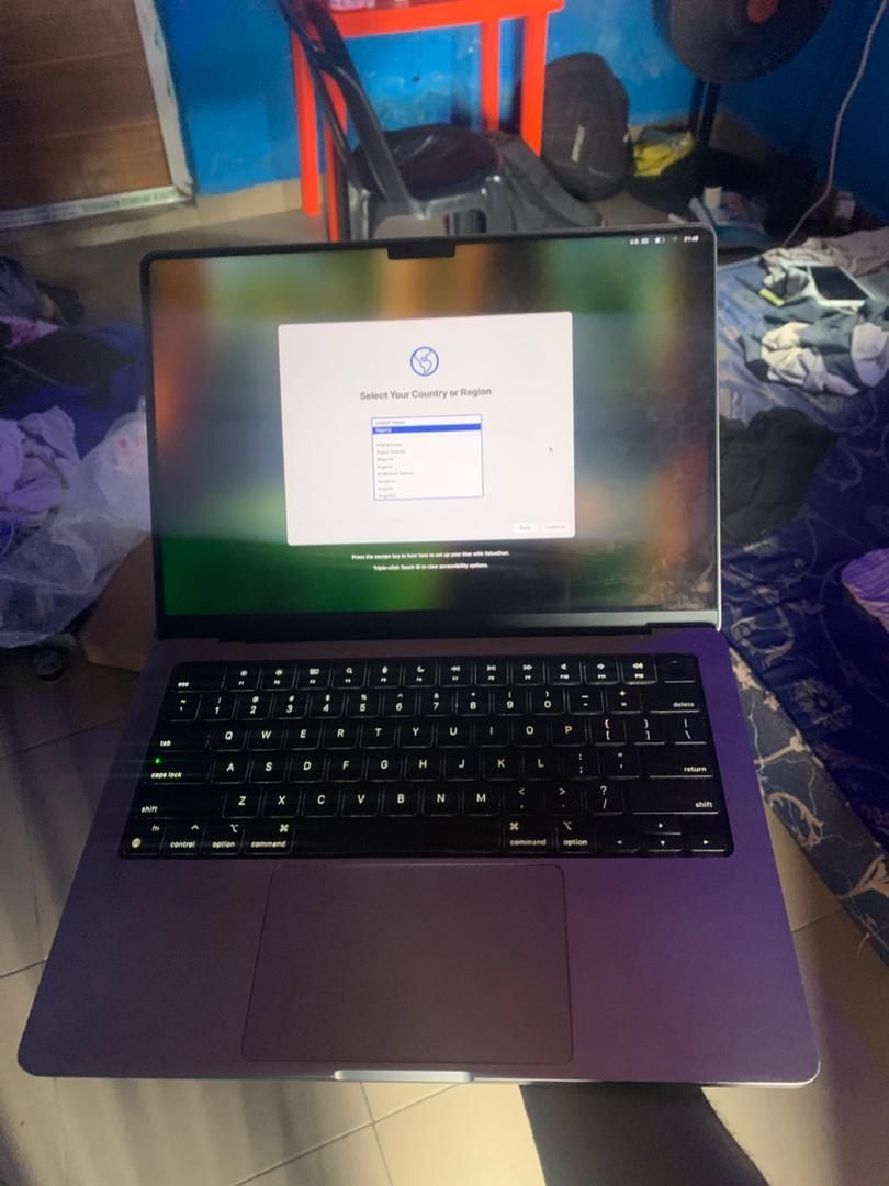 One Stranger Gave Am MacBook, See Wetin E Build One Year Later
